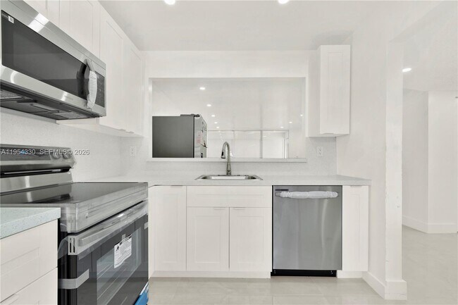 Building Photo - 8320 Sands Point Blvd