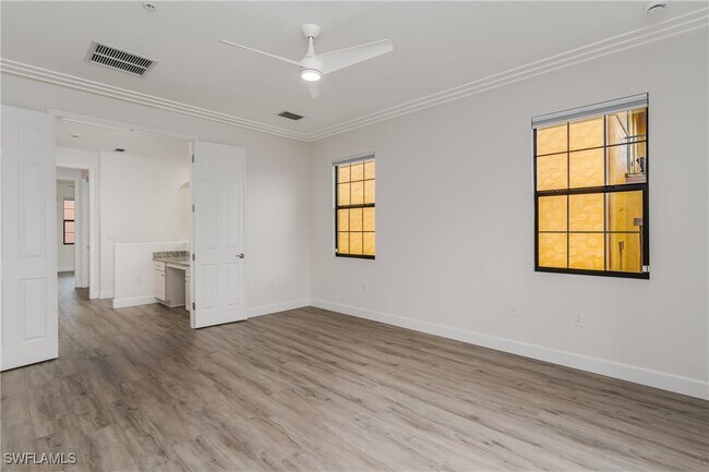Building Photo - 9072 Covina Dr N