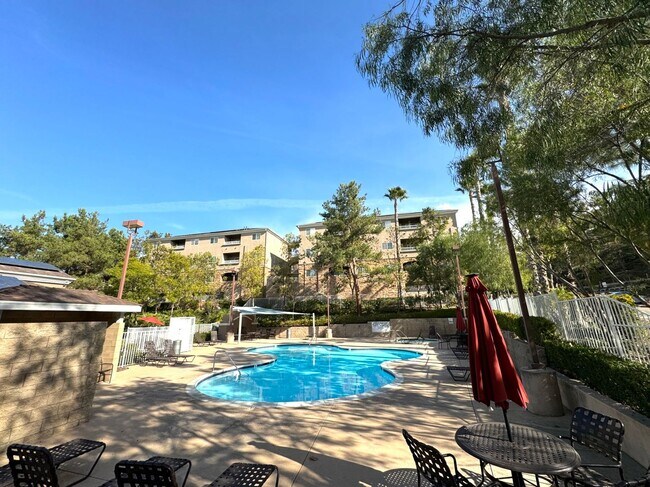 Building Photo - Cozy 2BD/2BA Condo in Grantville with Fireplace, Balcony & W/D