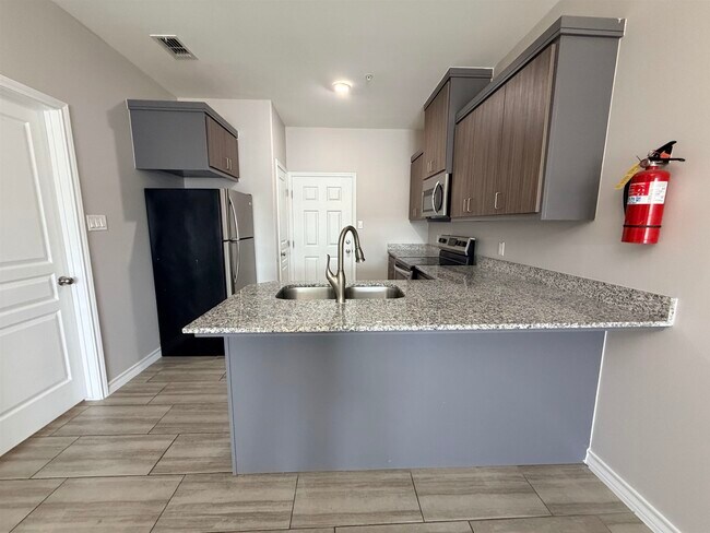 Building Photo - 5601 Cuenca Dr