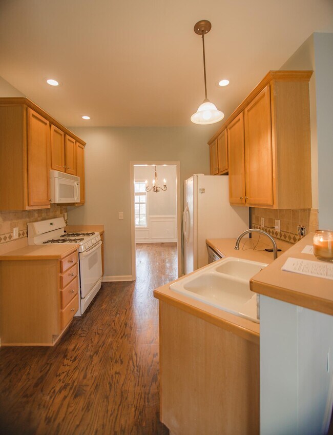 New kitchen countertop being installed. - 22 Brightling Ln