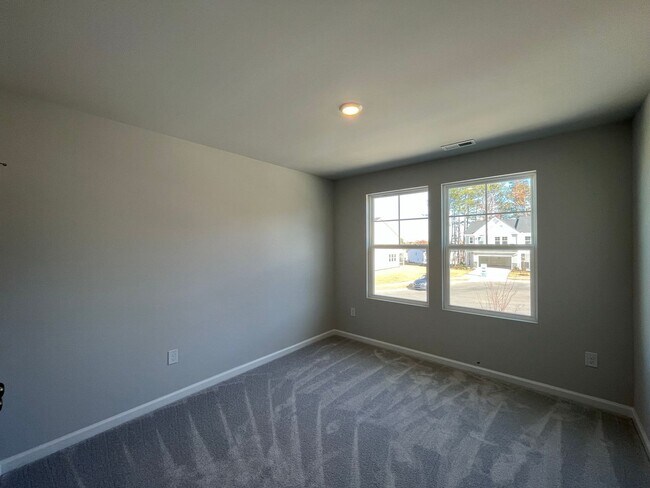 Building Photo - Newly Built 3BD, 2.5BA Raleigh Townhome with Premier HOA Amenities
