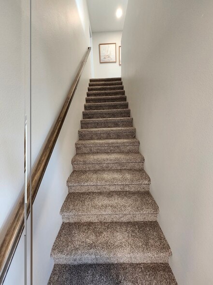 Stairs off the main entrance hallway leading to the upstairs - 5312 Welder Ave