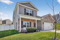 Building Photo - Coming Soon | Welcome to The Meadows Community | Where Modern Living Meets Space, Style, and Comfort