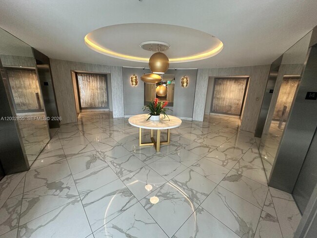 Building Photo - 10275 Collins Ave