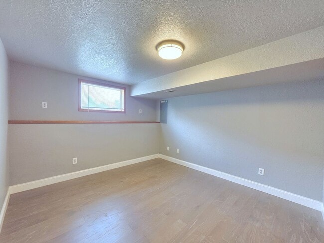 Building Photo - 3425 E 61st Ave