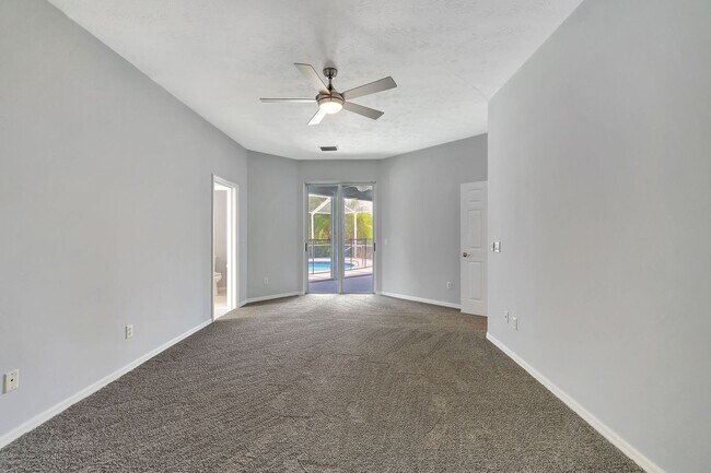 Building Photo - A BOATER'S PARADISE WITH THIS STUNNING 3 BEDROOM, 2 BATH WATERFRONT POOL HOME W/DOCK & BOAT LIFT ...