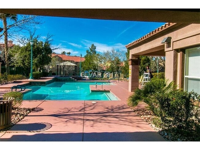 Building Photo - Gated Green Valley Ranch Townhome | 2 Bed | 2.5 Bath | 2-Car Garage