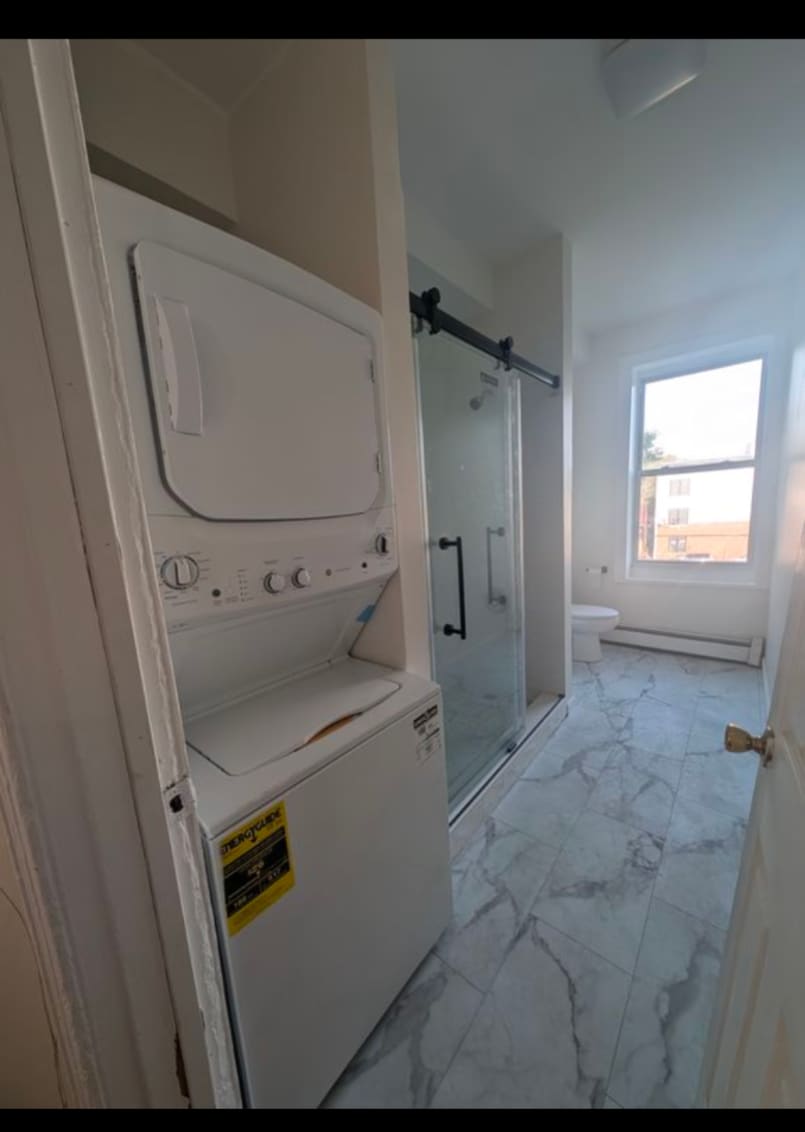 Bathroom 1 with washer and Dryer - 56 Madison Ave