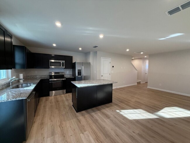 Building Photo - Modern 3-Bedroom Townhouse with Garage & Private Patio