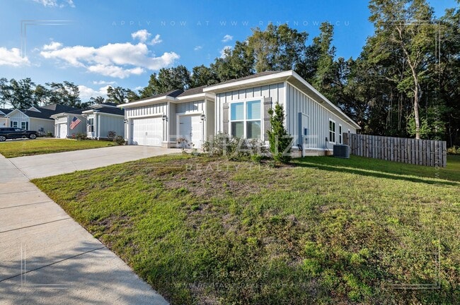Building Photo - Charming Gold Fortified Home in Live Oak Estates – Near Downtown Fairhope!