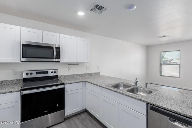 Building Photo - 9930 W Carousel Dr