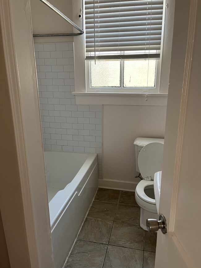 Newer subway tile in bathroom - 504 Adams St