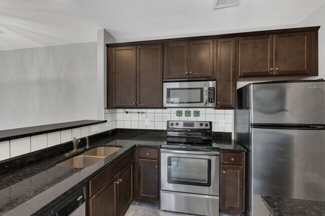 Building Photo - Stylish Condo with Balcony Views in South Nashville