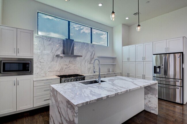 Building Photo - New construction, 4 story home with 3 beds...