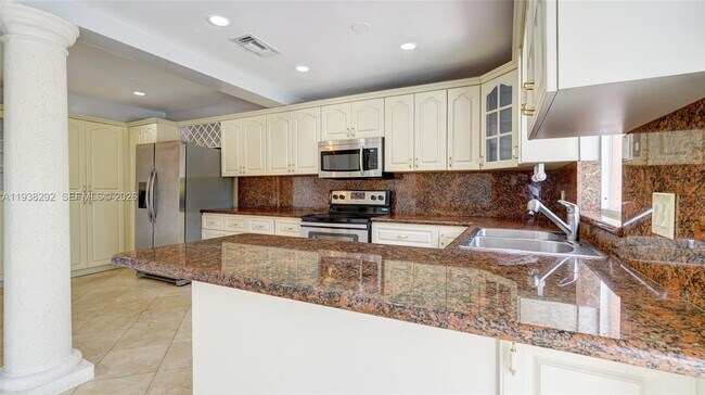 Building Photo - 1299 W 77th St