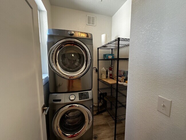 Building Photo - "Experience Modern Comfort: Spacious 2-Bed...