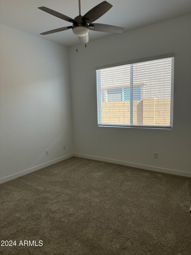 Building Photo - 7710 W Jackrabbit Ln