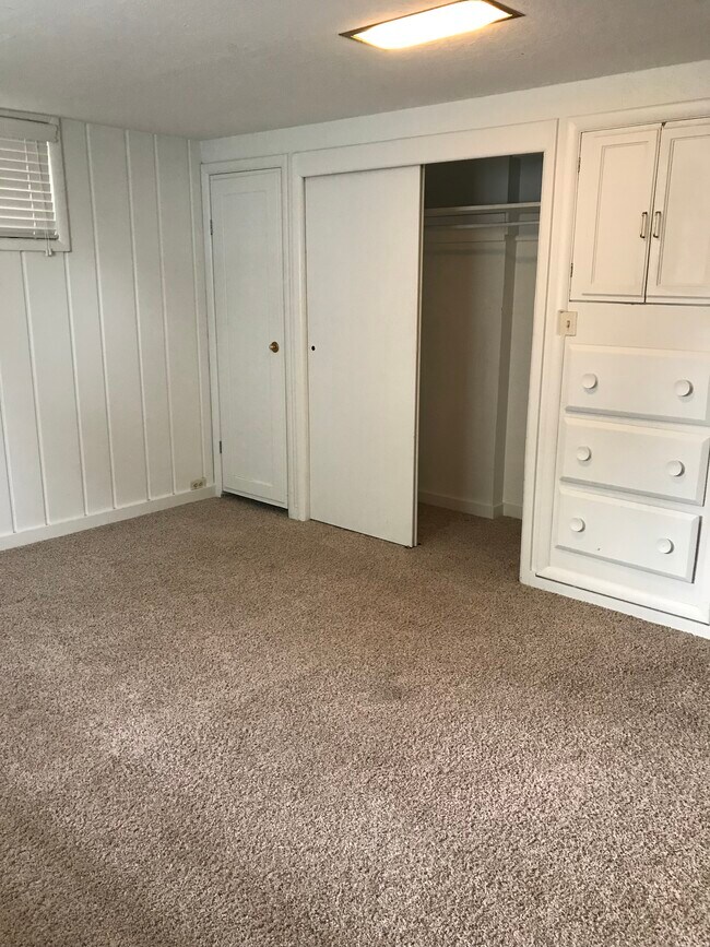 Basement bedroom with lots of built-ins - 1202 9th St W