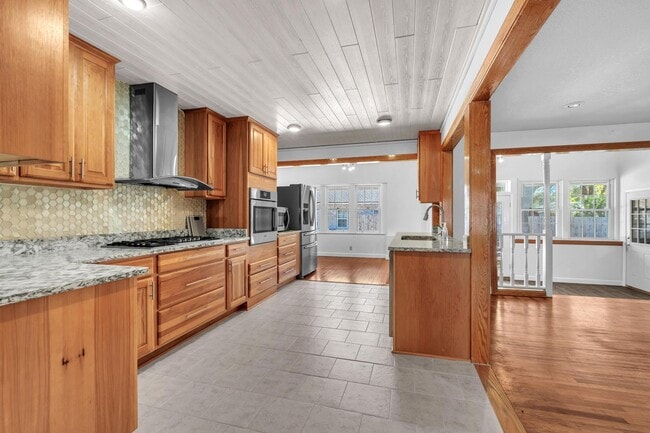Building Photo - Charming home with large garage & attached...