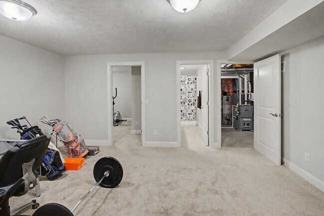 Building Photo - Spacious 4-Bedroom, 3.5-Bathroom Townhome & 2-Car Garage-West Champaign