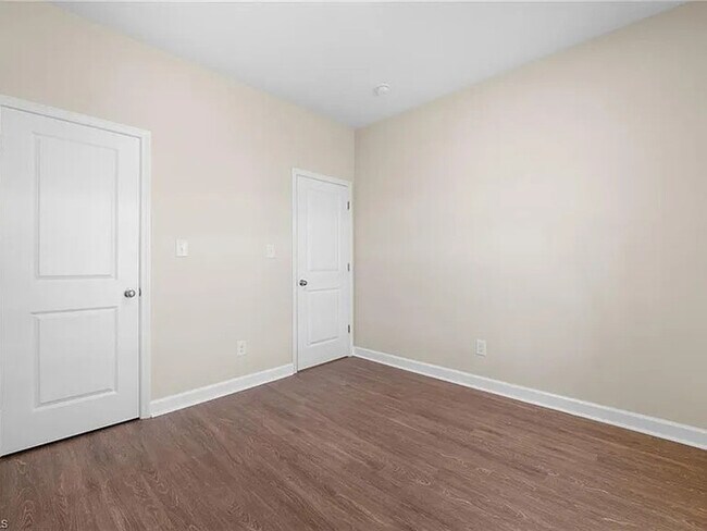 Building Photo - Earn Wealth While Leasing - Like a Homeown...