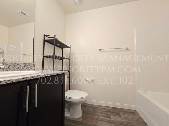 Building Photo - Gated~ 2 Bedroom Townhome w/2 Car Garage~MUST SEE!