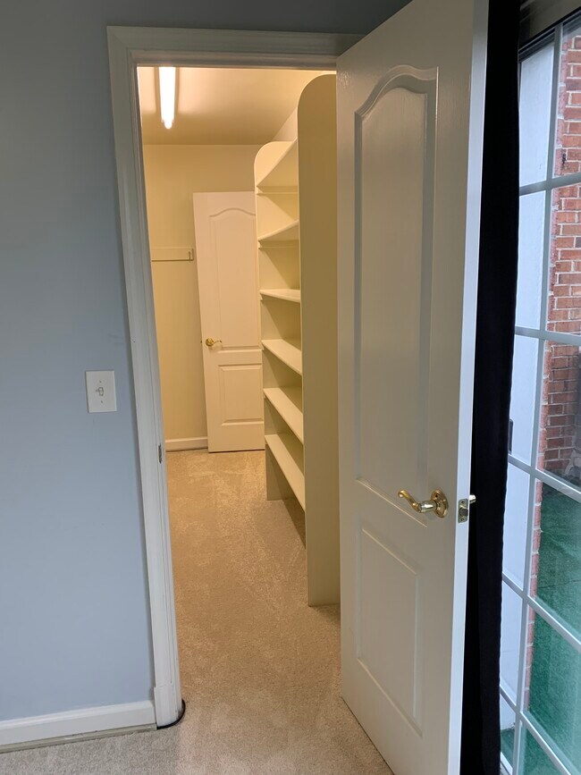 The big walk-in closet with another walk-in storage closet - 6916 Fairfax Dr