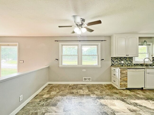 Building Photo - Spacious Redone Rambler with Huge 1/2 Acre Yard, Deck, Patio, Primary Suite, 3-BRs on Main Level ...