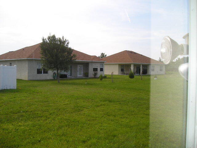 Building Photo - "Charming 3-Bedroom Haven with 2 Baths in Palm Coast – 1208 Sq Ft of Cozy Living!"