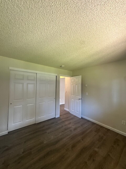Building Photo - 2-Bedroom, First Floor Corner Unit with Laminate Flooring
