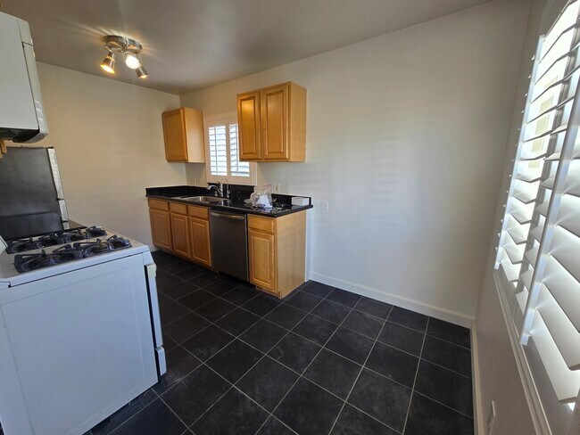 Building Photo - 17329 Denker Ave