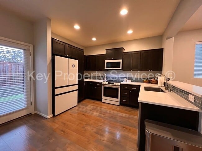 Building Photo - *MOVE IN SPECIAL!* Stunning Hazel Dell Two-Story with High End Appliances