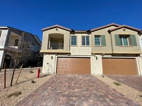 Building Photo - GATED 2 BED 2.5 BATH 2 CAR GARAGE 2 FLOOR TOWNHOUSE IN HENDERSON