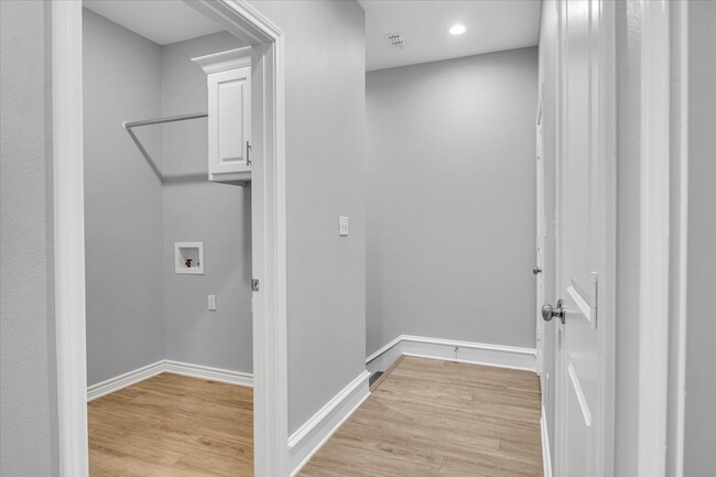 Hallway to Laundry Room - 10670 Washita Dr