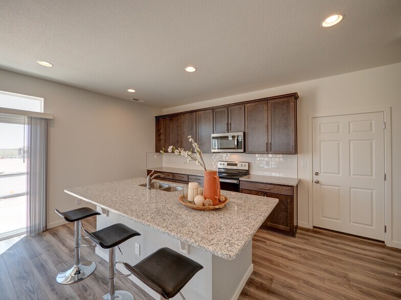 9278 Turlough door to the garage is off the kitchen. - 9278 Turlough Hts
