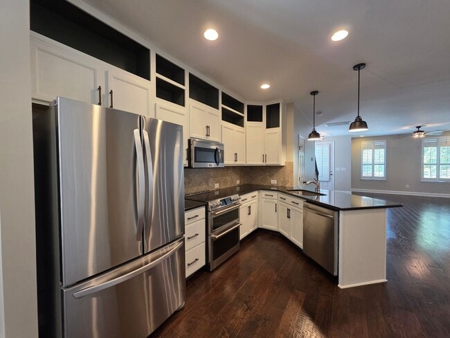 Building Photo - For Lease  End-Unit 3-Bedroom Townhome wit...