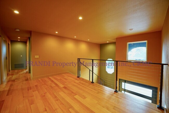 Building Photo - Sleek, Expansive, Designer Home with Priva...