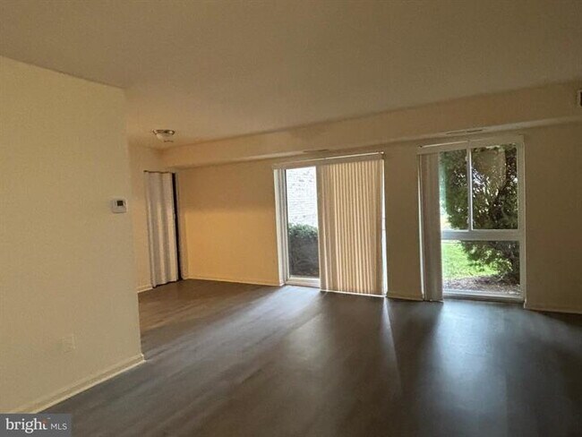 Building Photo - Charming Edsall Bluff Condo: Your Alexandria Oasis