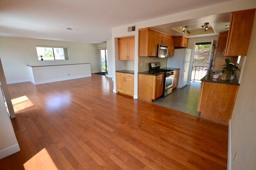 Open living dining kitchen area - 3161 Weldon Ave