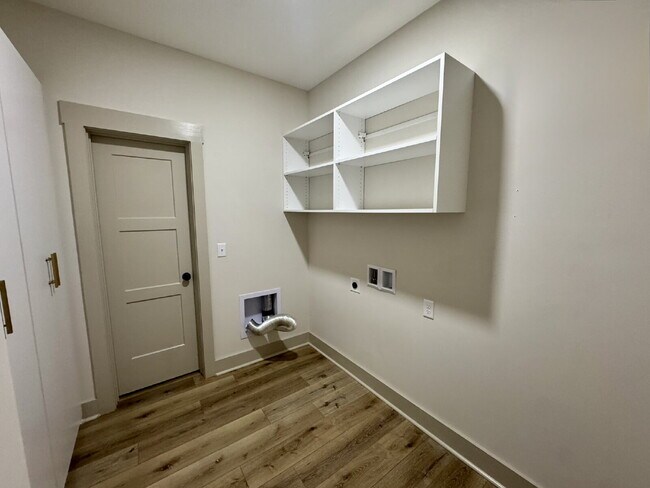 Building Photo - Need Space?  How about 5 bedrooms, 2.5 baths + an extra bonus area upstairs so that the kids can ...