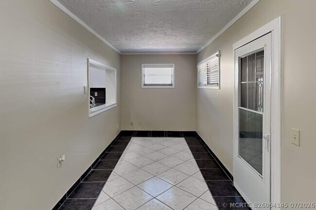 Building Photo - 9575 NW 25th Ct