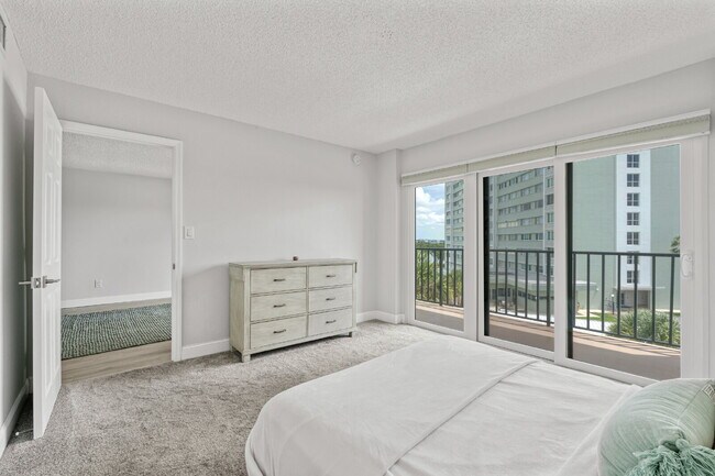 Building Photo - NEWLY RENOVATED TWO BEDROOM CONDO IN WATERFRONT RESORT STYLE COMMUNITY
