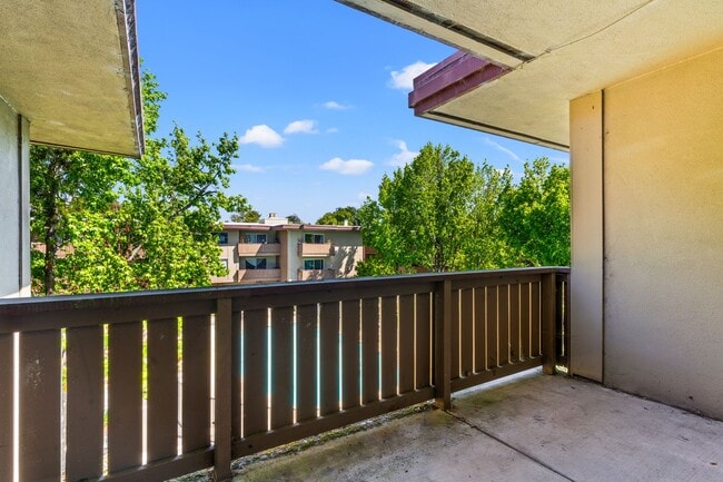 Building Photo - Modern 2-Bedroom Condo with Pool and Koi Pond Views