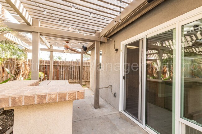 Building Photo - 3 Bedroom/2 Bath with a Pool and Solar - $...