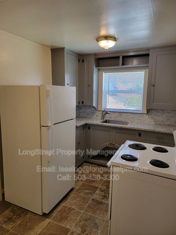 Building Photo - 205 NW Kings Blvd