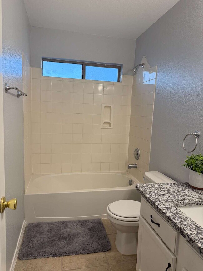 Building Photo - "Charming 3-Bed Oasis with Granite Touches...