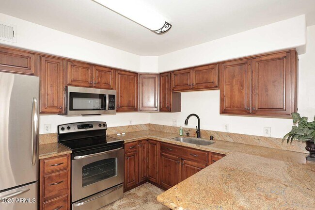 Building Photo - 7910 E Camelback Rd