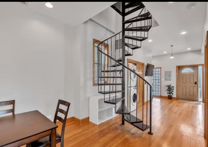 stairs and laundry area - 1353 S California Ave