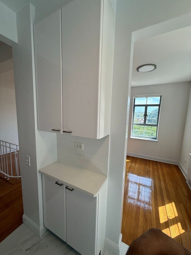 Building Photo - The Leslie — A Private Garden Enclave for the Modern New Yorker